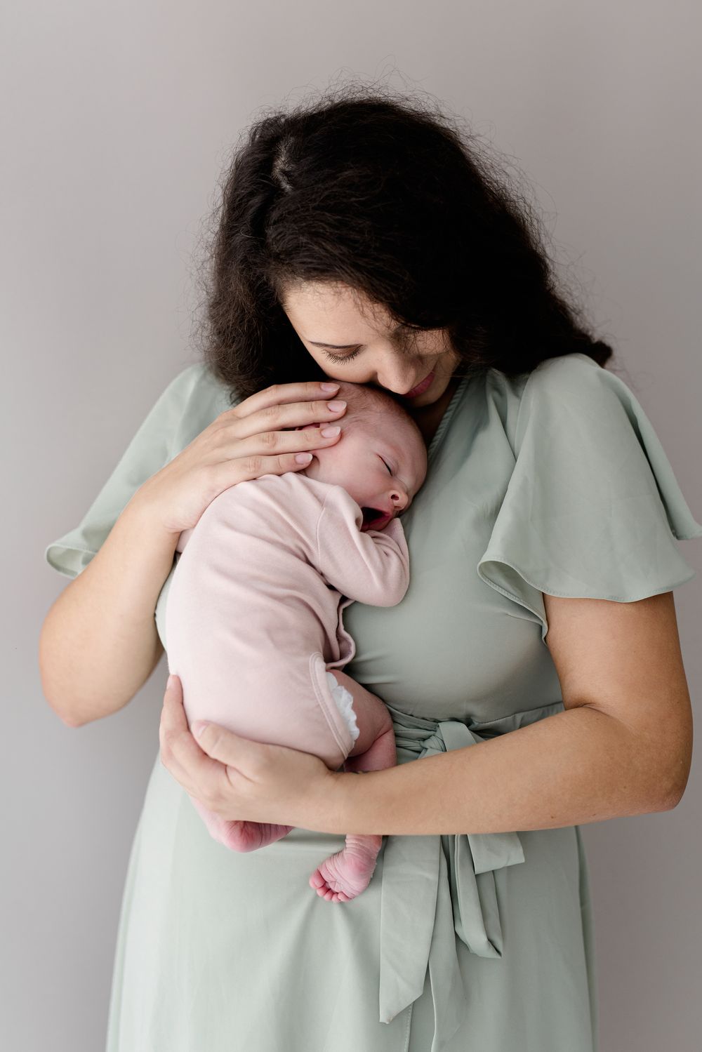 Pija holding her newborn daughter